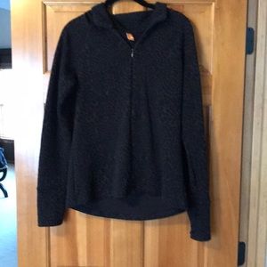 Lucy animal print half zip top. Sleeves zip too.